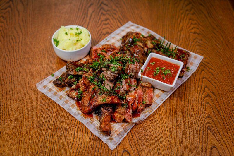 Fire-grilled meat platter at Zizi's Restaurant, Umtentweni, KZN South Coast