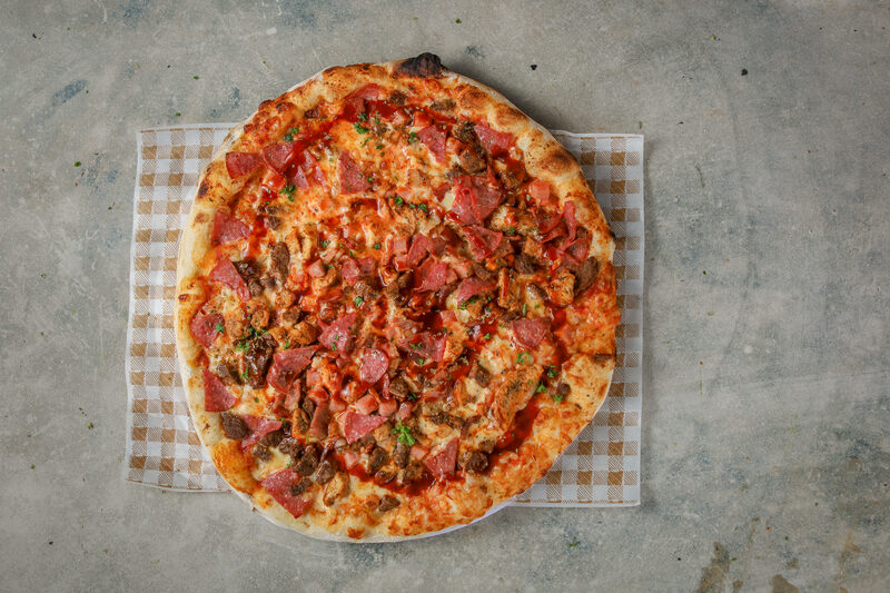 Sourdough pizza with fresh toppings at Zizi's Pizza Bar, Umtentweni, KZN South Coast