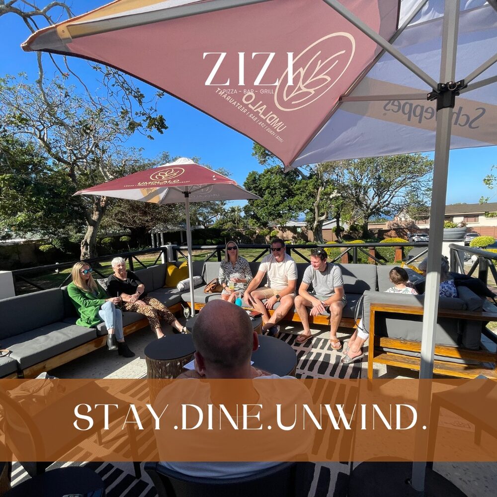 Outdoor seating and firepit at Zizi's Restaurant, Umtentweni, KZN South Coast